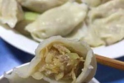 东北酸菜包饺子_东北酸菜包饺子怎么吃好吃