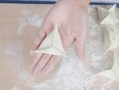 包饺子三角形的皮怎么包视频